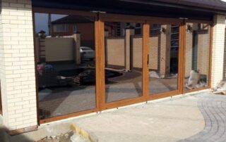 Розсувна система REHAU SYNEGO ламінаці я Золотий дуб